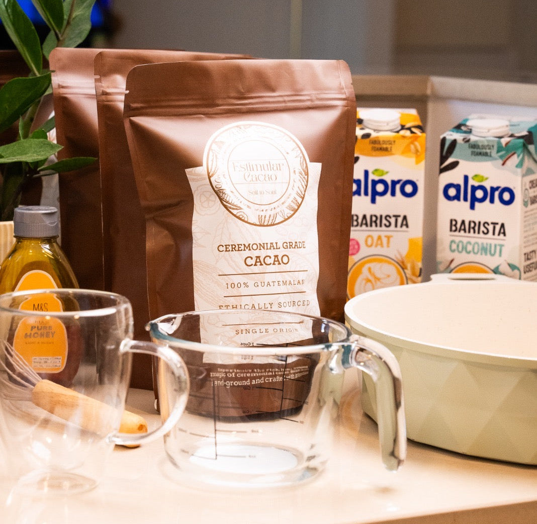 Ceremonial Grade Cacao package with Alpro products on a kitchen counter.